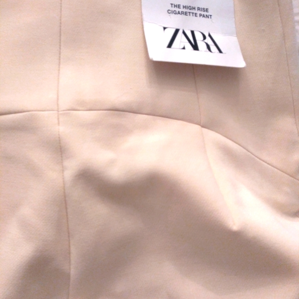 Beautiful hair of Zara off-white pants.